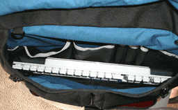 inside the front pocket, with a keyboard for scale